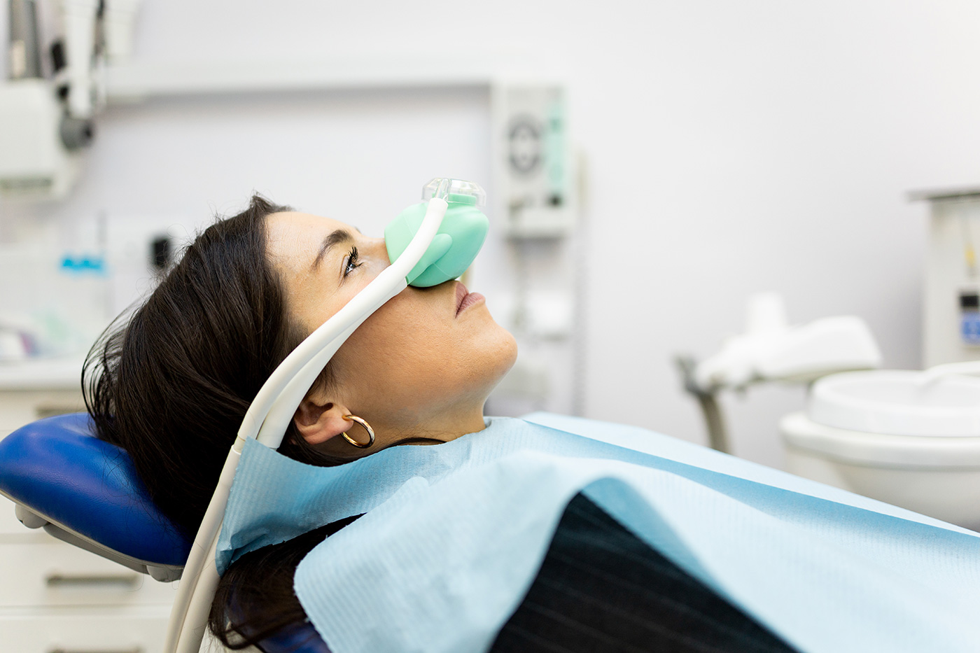 Patient using a dental comfort mask