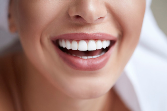 Patient smiling after restorative dental care